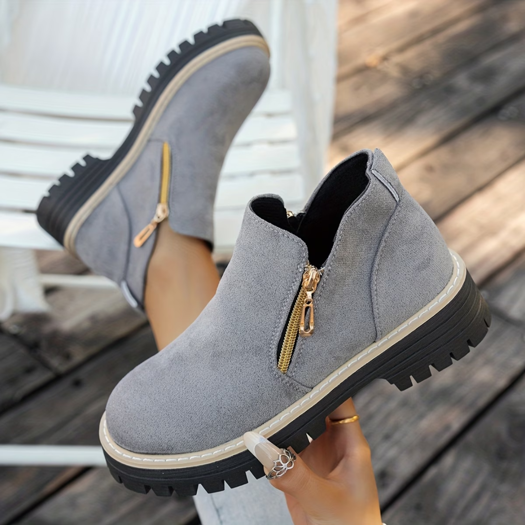 Nicoletta | Botines elegantes con cremallera dorada
