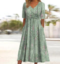 ELARA | Vestido Midi Estampado Elegante que Disimula el Abdomen