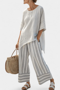 Talvora | Blusa Asimétrica Elegante y Pantalón de Rayas