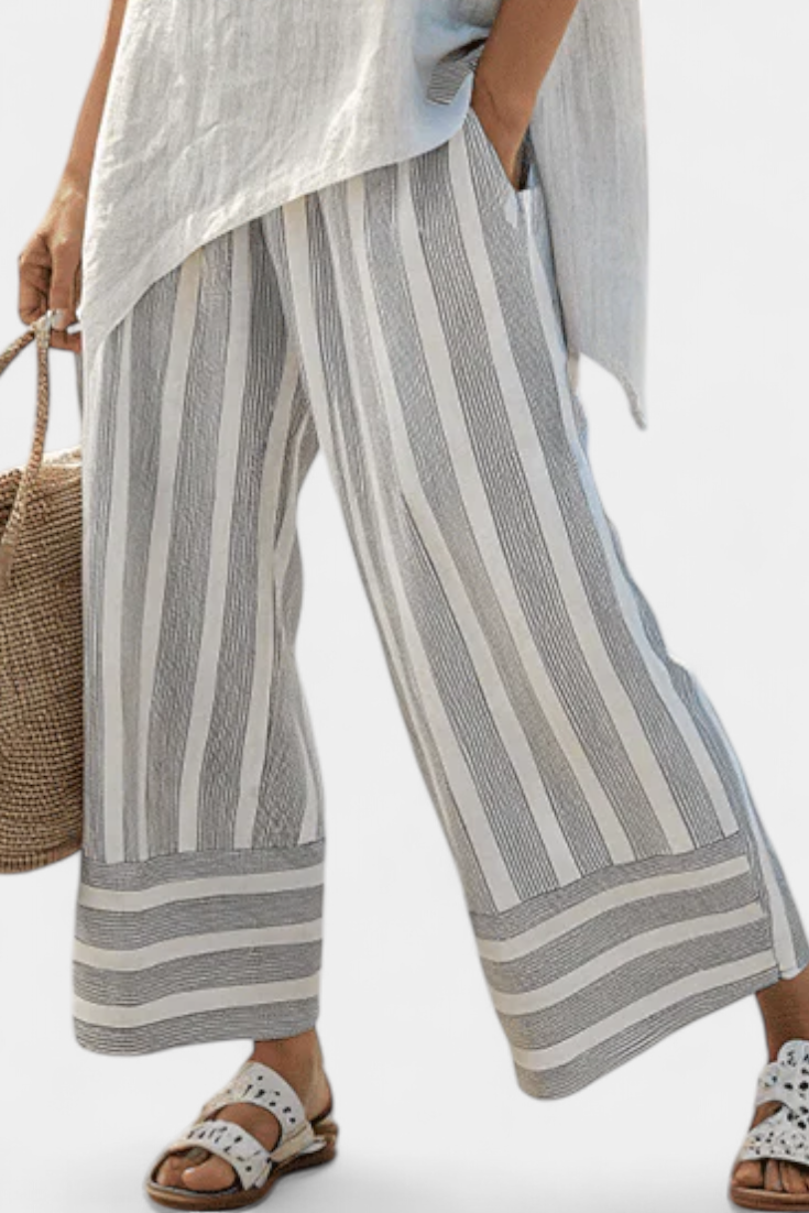 Talvora | Blusa Asimétrica Elegante y Pantalón de Rayas